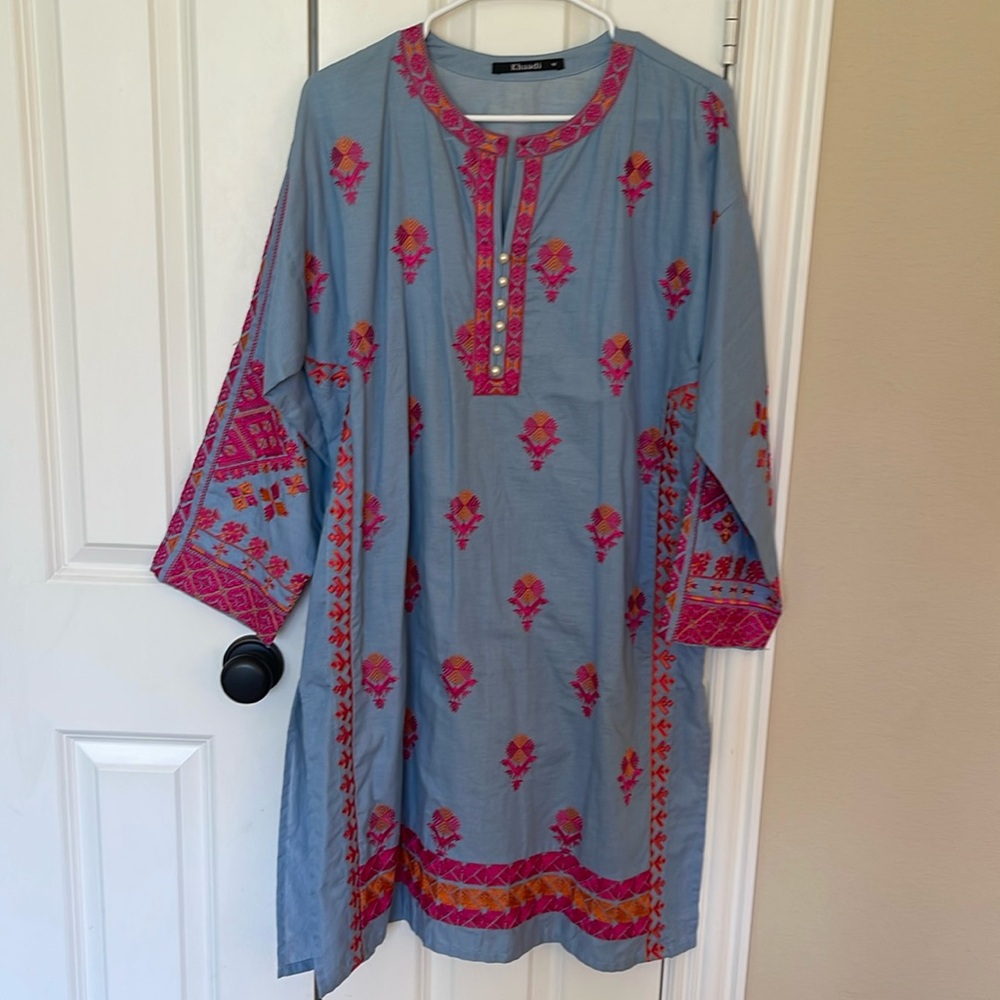 Indian Pakistani kurta with embroidery.